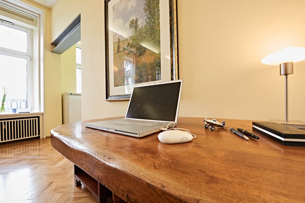 3-room apartment App501 living area desk cabinet parquet floor